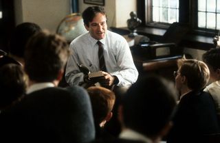 robin williams as a teacher talking to a group of boys in Dead Poets Society (1989)