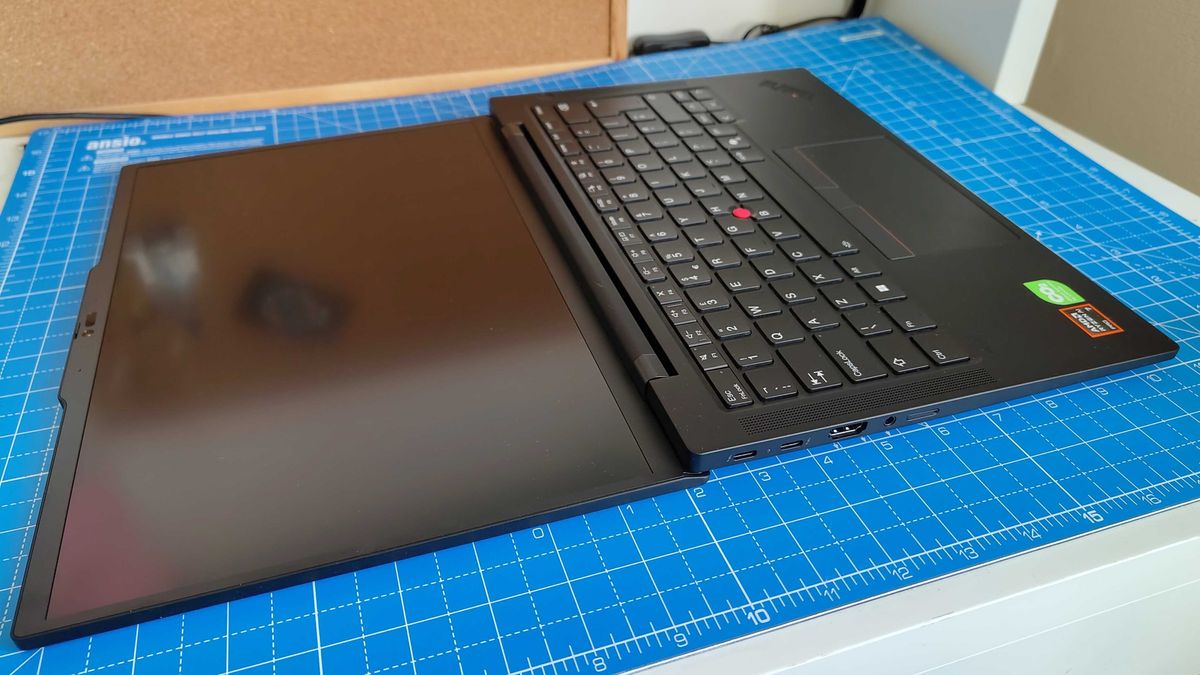 Testing the Lenovo ThinkPad T14s Gen 6 laying flat on a desk in a home office