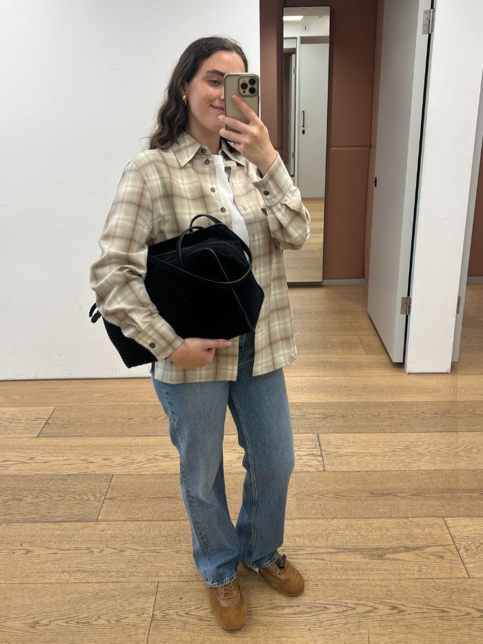 Who What Wear's @avahgilchrist wears COS's viral flannel shirt.