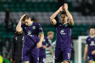 GLASGOW, SCOTLAND - DECEMBER 06: Hibernian's Paul Hanlon and Joe Newell look dejected at full time during a cinch Premiership match between Celtic and Hibernian at Celtic Park, on December 06, 2023, in Glasgow, Scotland. (Photo by Craig Foy/SNS Group via Getty Images)