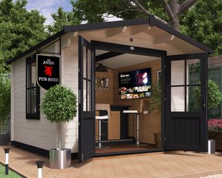 shed converted into a garden bar with TV on the wall
