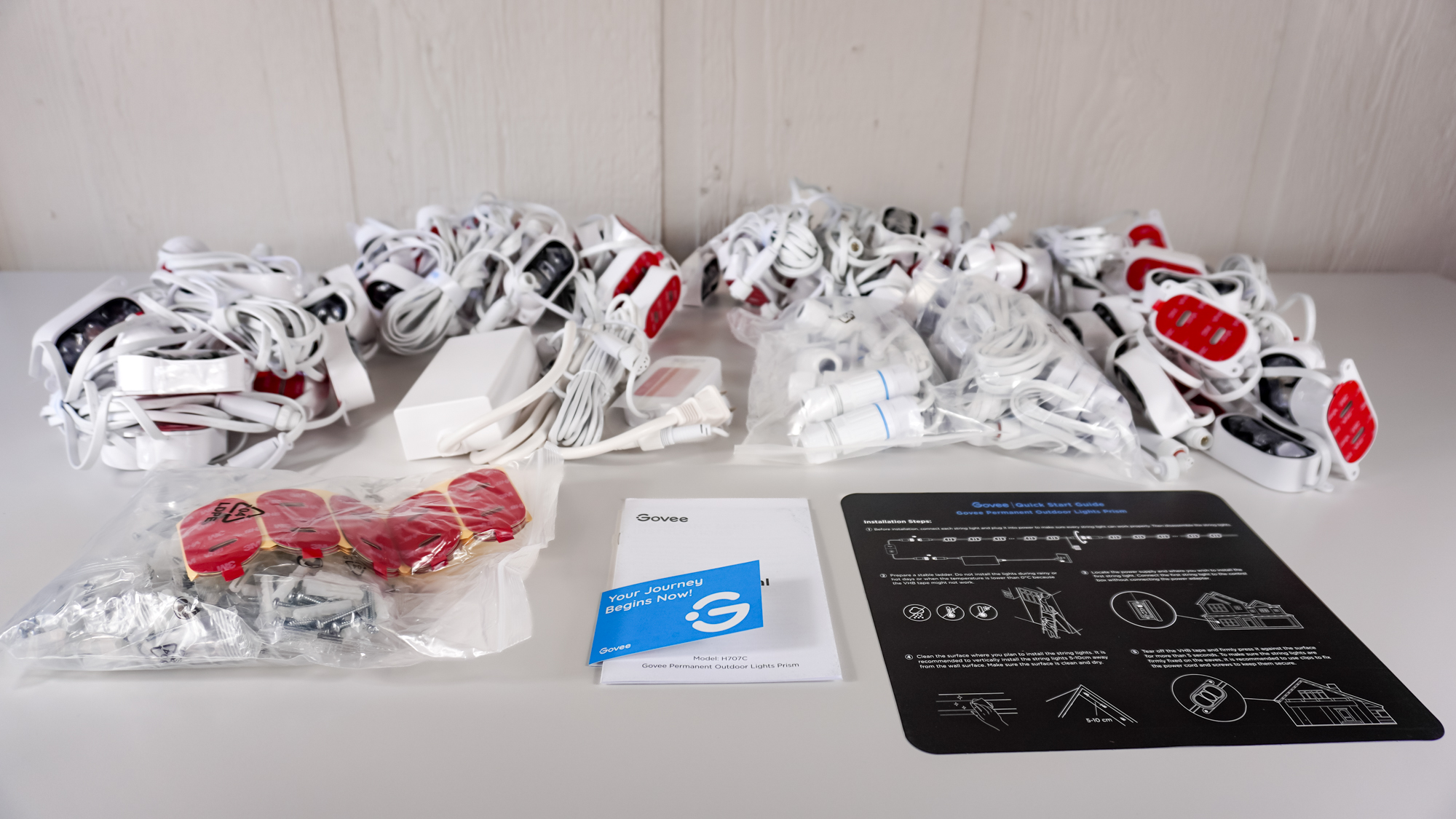 The Govee Permanent Outdoor Lights Prism 200 foot set unboxed on a table