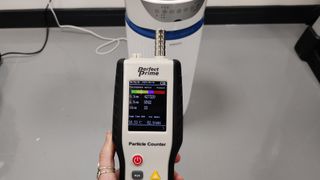 Homedics totalclean deluxe 5-in-1 being tested with an air particle monitor
