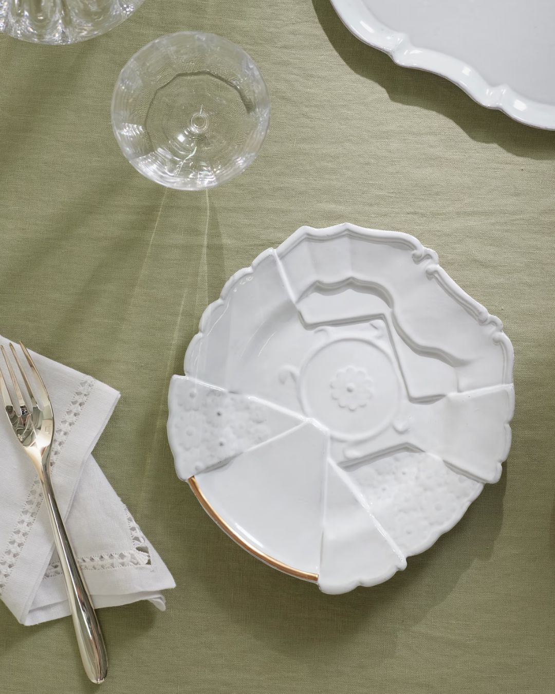 + Sacai Patchwork gold-plated ceramic dinner plate.