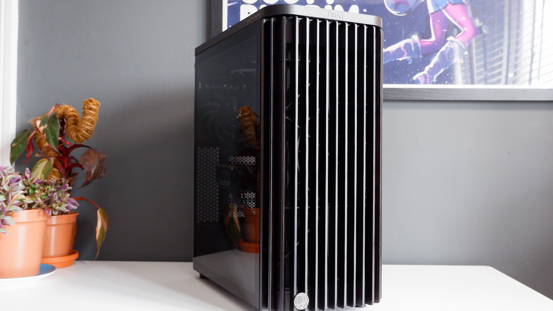 A gaming PC in the process of being built, using Radeon and Ryzen components and an Asus Pro Art PA401 PC case.