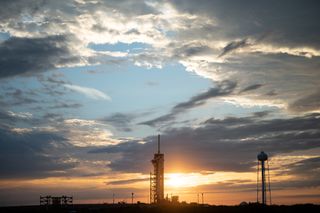 In this sunset image, you can see a SpaceX Falcon 9 sitting on the launch pad at Launch Complex 39A at NASA's Kennedy Space Center in Florida. The rocket is holding the company's Crew Dragon spacecraft, which will launch four astronauts to the International Space Station on April 22 as part of SpaceX's Crew-2 mission. The Crew-2 mission will include NASA astronauts Shane Kimbrough and Megan McArthur, ESA astronaut Thomas Pesquet and JAXA astronaut Akihiko Hoshide.