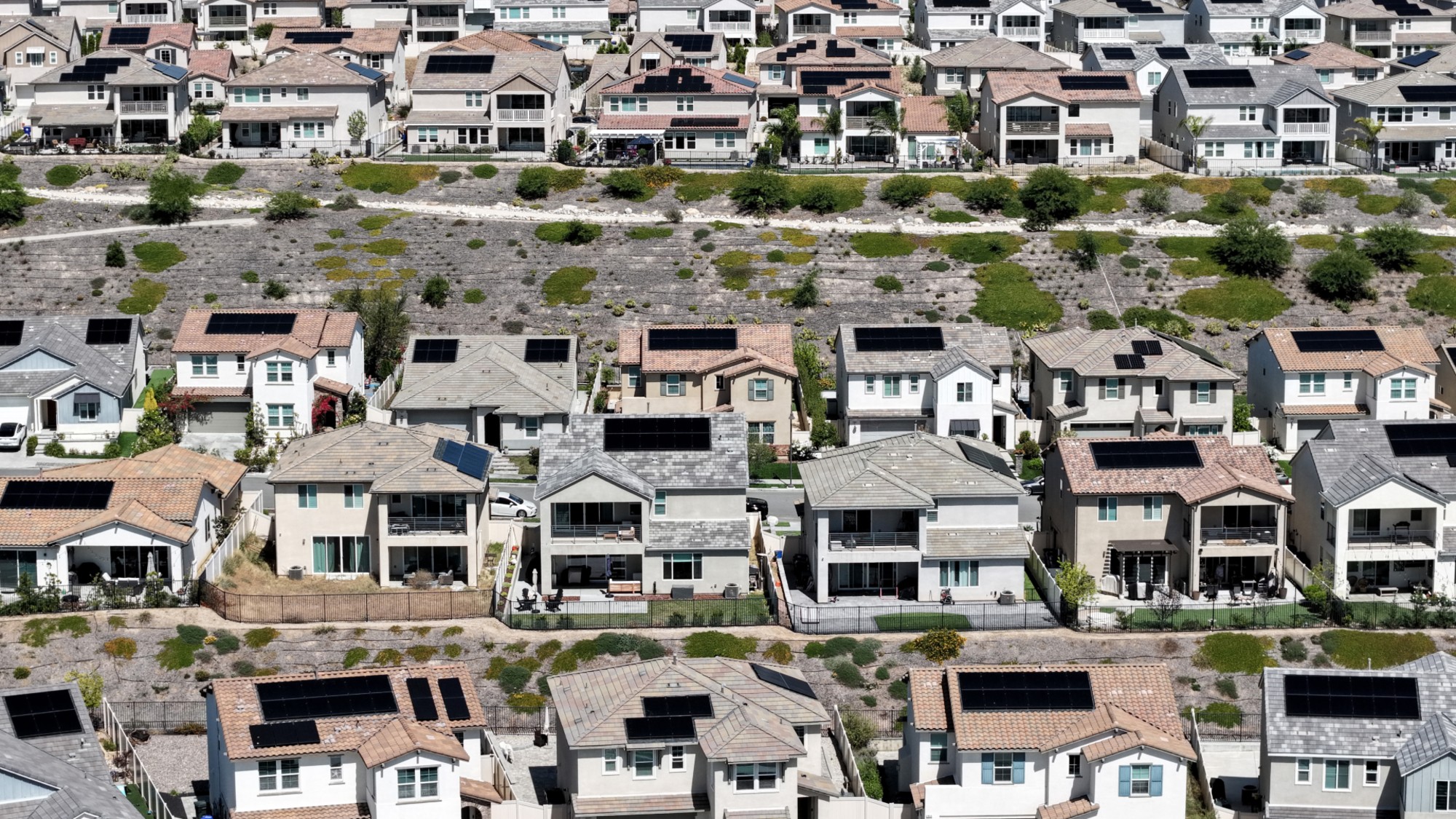 Houses with solar panels on the roofs are seen in Santa Clarita, California. 