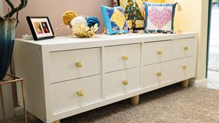 while sideboard console unit IKEA Kallax hack with gold handles