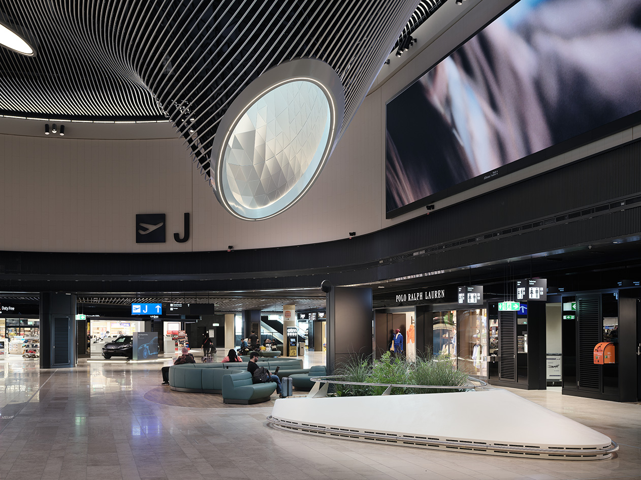 Frankfurt Airport interior The Marketplace, designed by LAVA, a flowing organic ceiling design with a skylight