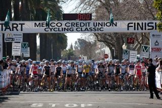 The women's field prepares to depart on thirty two laps of the downtown criterium course.