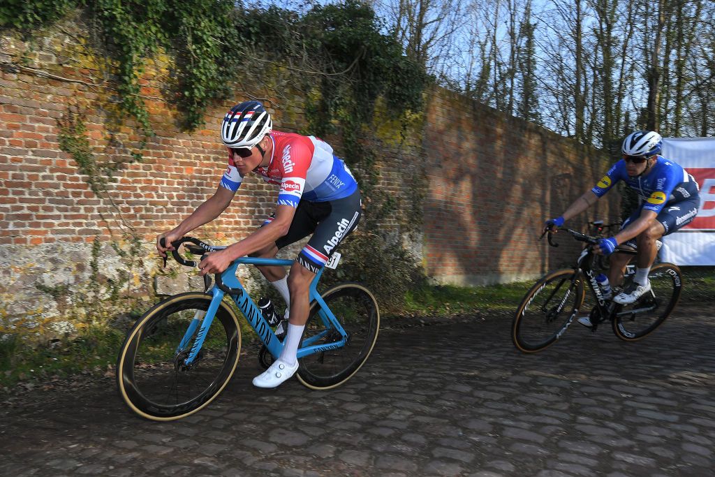 DOUR BELGIUM MARCH 02 Mathieu van der Poel of The Netherlands and Team AlpecinFenix Alvaro Jose Hodeg Chagui of Colombia and Team Deceuninck QuickStep during the 53rd Grand Prix Le Samyn 2021 Mens Elite a 2054km race from Quaregnon to Dour GPSamyn on March 02 2021 in Dour Belgium Photo by Luc ClaessenGetty Images