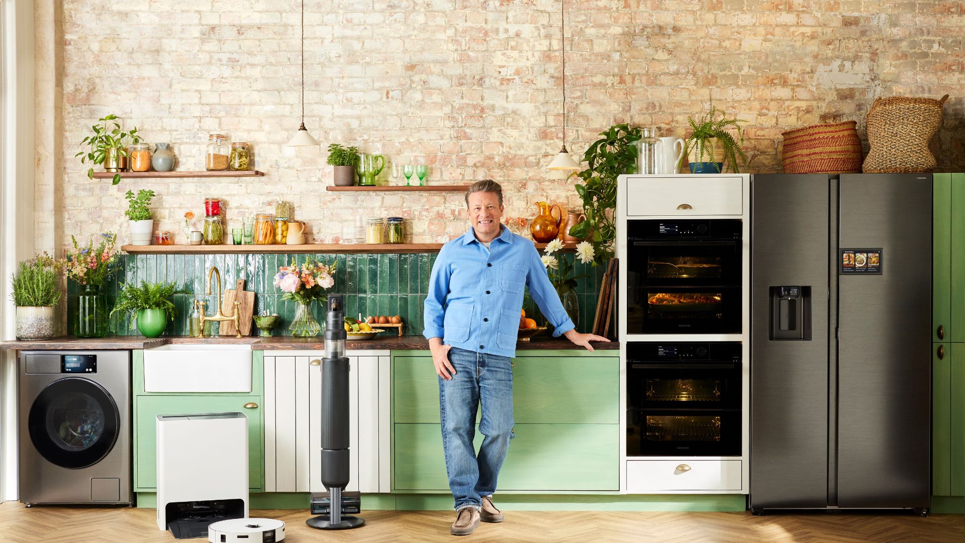 Jamie Oliver stood with his Samsung Bespoke AI range