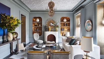a grey living room with a wallpapered ceiling
