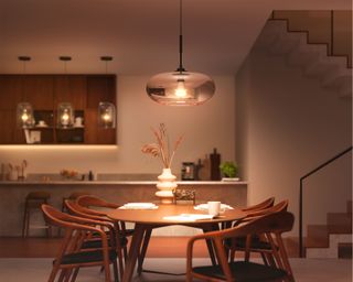 Kitchen table with smart lighting installed above