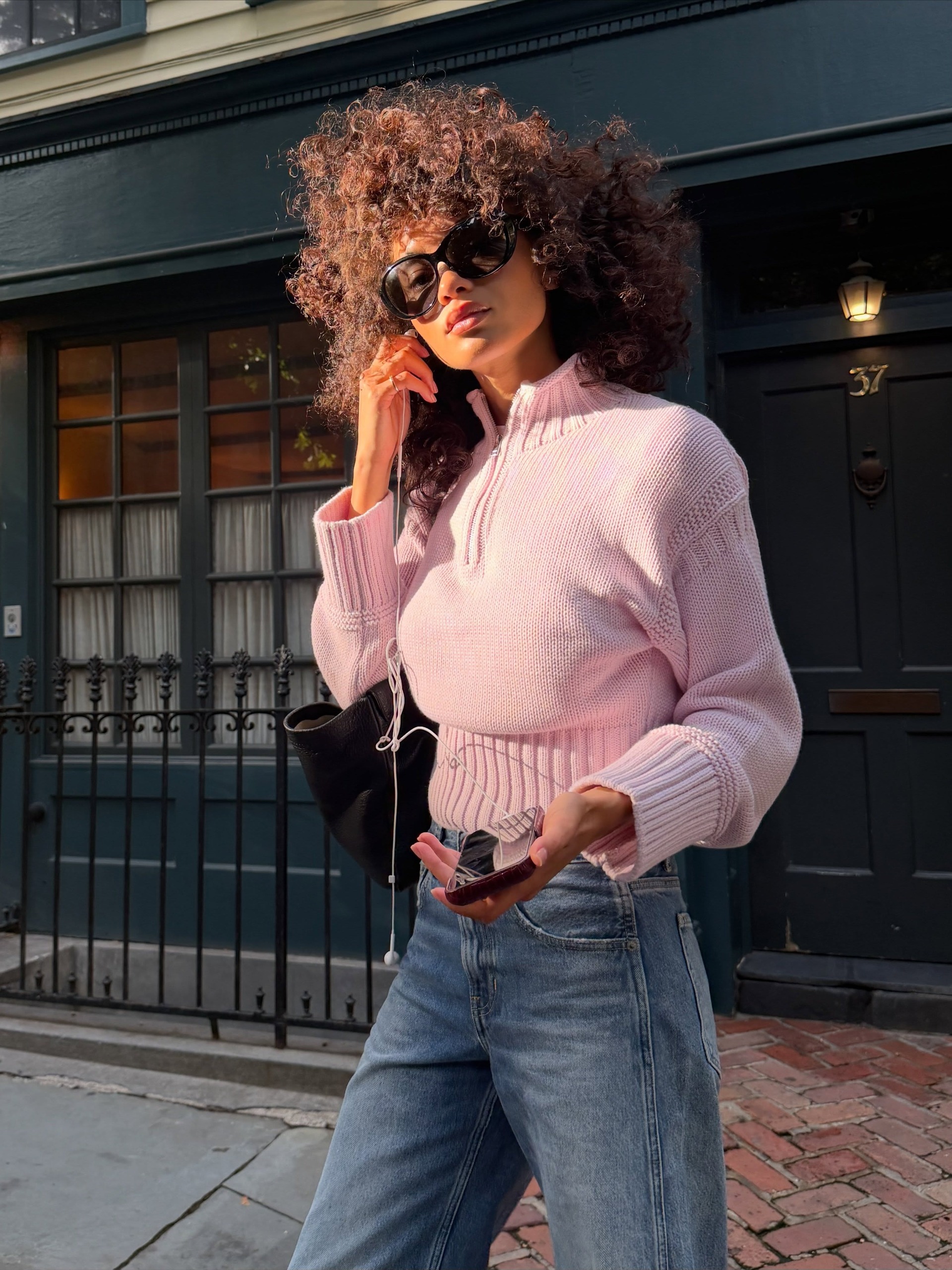 Jamea wearing pink rollneck