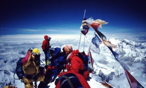 A group of climbers on Mount Everest&amp;#039;s summit: Thousands of people have made it to the top of the world&amp;#039;s tallest mountain, but hundreds have died trying.