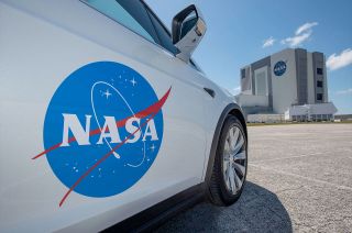 SpaceX will transfer NASA astronauts to the launchpad in a NASA-logo adorned Tesla Model X SUV.