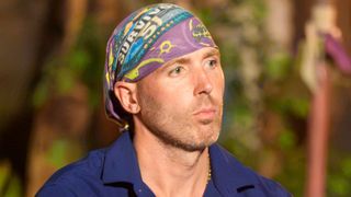 Rob at the tribal council with a weird plan in mind. 