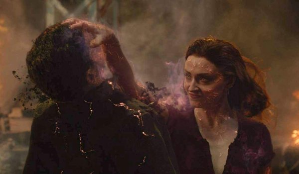 Dark Phoenix Jean Grey grabs Magneto and starts to burn him inside out
