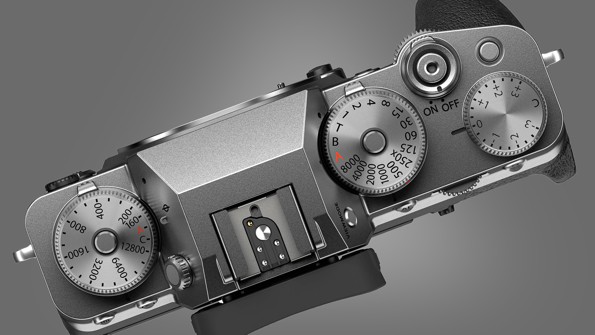 The Fujifilm X-T4 camera on a grey background