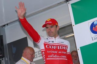 Stéphane Auge (Cofidis) heads on stage to receive the sprinter's jersey.