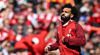 Mohamed Salah of Liverpool warms up before a match
