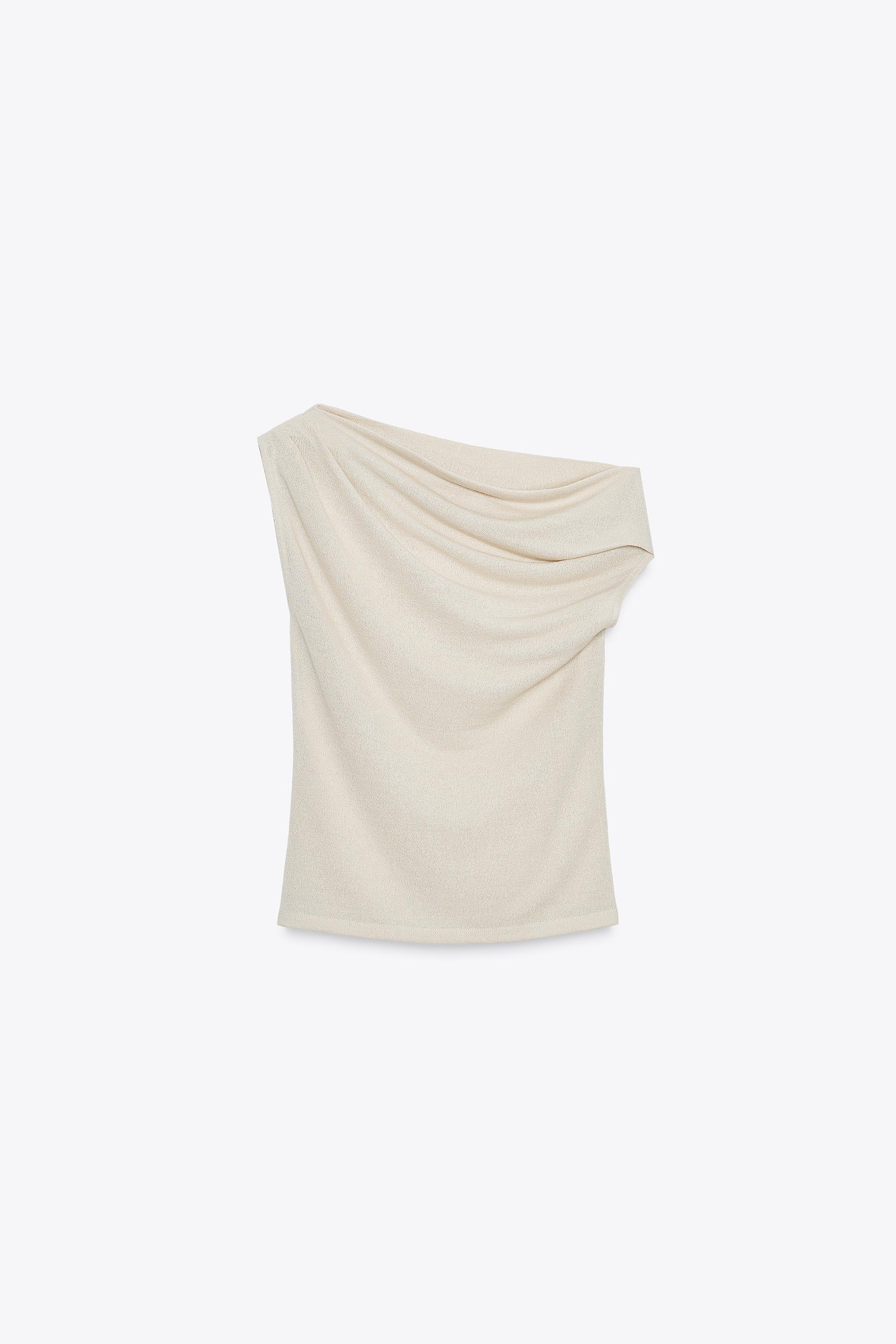Asymmetric Cut-Out Knit Top