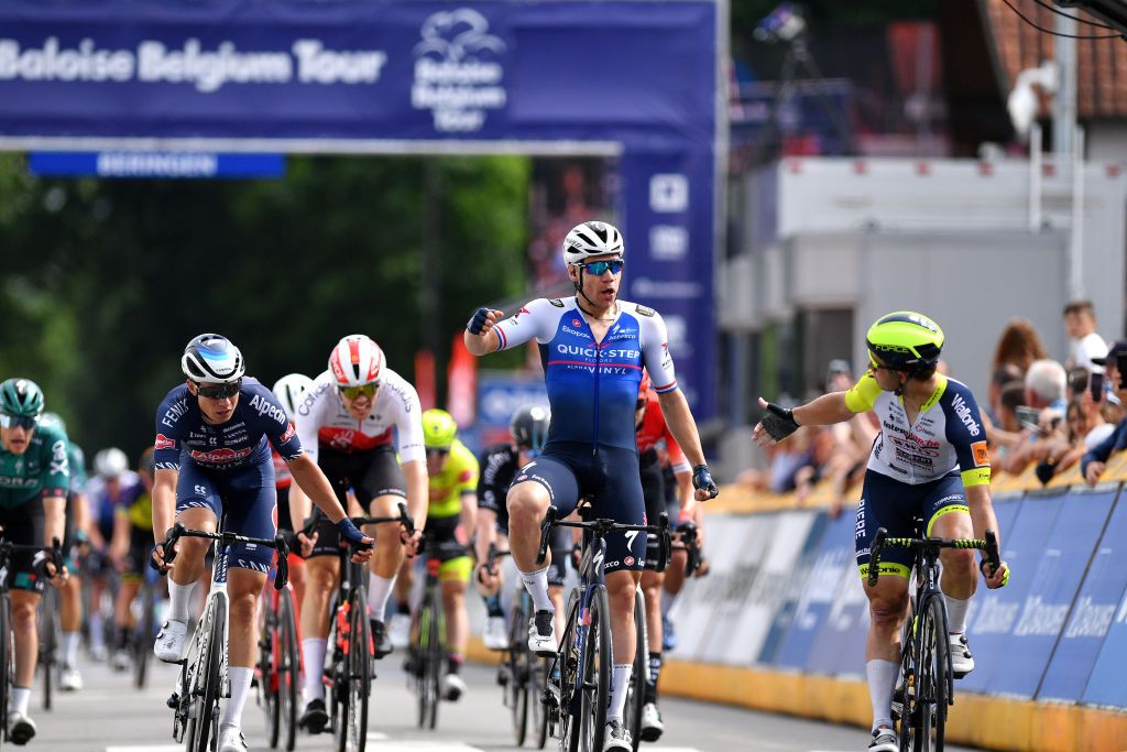 BERINGEN BELGIUM JUNE 19 Fabio Jakobsen of Netherlands and Team QuickStep Alpha Vinyl celebrates winning ahead of Jasper Philipsen of Belgium and Team AlpecinFenix and Gerben Thijssen of Belgium and Team Intermarch Wanty Gobert Matriaux and have a discussion during the 91st Baloise Belgium Tour 2022 Stage 5 a 1799km stage from Gingelom to Beringen BaloiseBelgiumTour on June 19 2022 in Beringen Belgium Photo by Luc ClaessenGetty Images