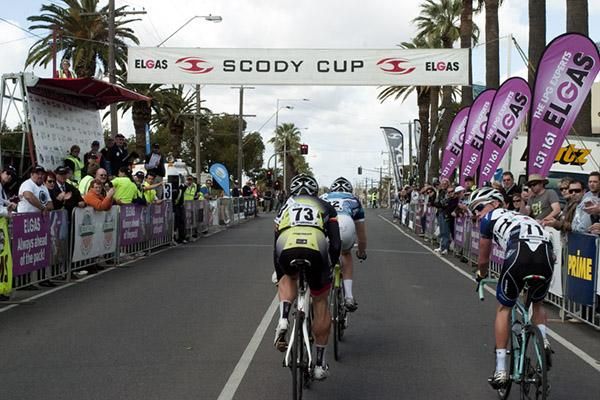 Patrick Lane (Team Jayco Skins) sneaks a peek over his shoulder looking for the chasing peloton whilst in a break with Matthew Wheatcroft (BlackPeloton) and Michael Cupitt (Merida Australia Road Team).