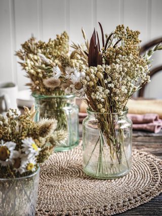 A table setting with dried flowers