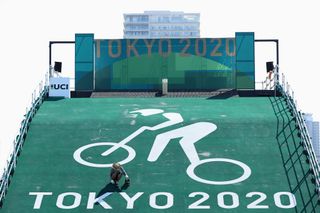 TOKYO JAPAN JULY 19 A worker paints the start ramp at the Cycling BMX racing venue at the Ariake Urban Sports Park ahead of the 2020 Tokyo Summer Olympic Games on July 19 2021 in Tokyo Japan The Ariake Urban Sports Park will host skateboarding and BMX cycling events Photo by Cameron SpencerGetty Images