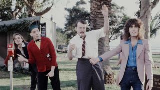 Cheap Trick posing outside in 1978
