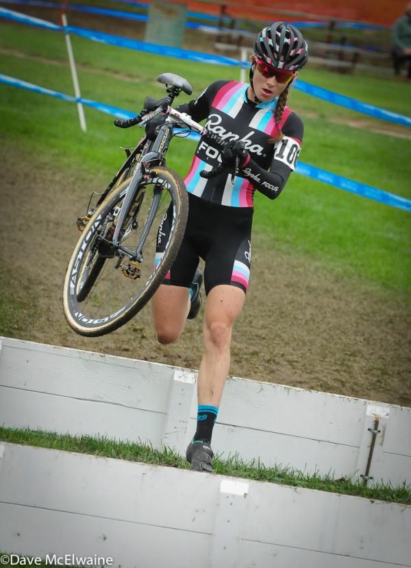 Julie Krasniak (Rapha Focus) running the second set of barriers