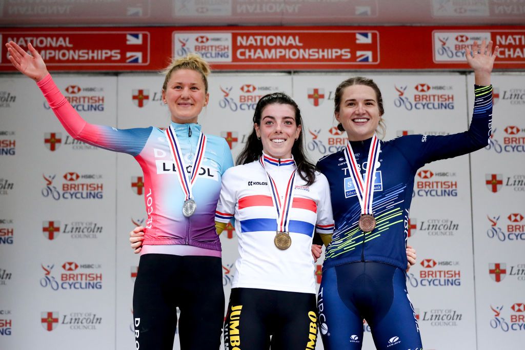 LINCOLN ENGLAND OCTOBER 14 L R Joscelin Lowden of team Drops le Col Supported by Temp Anna Henderson of team JumboVisma and Leah Dixon of team TIBCOSilicon Valley Bank celebrate on the podium after the Womens Individual time trial during the HSBC UK National Road Championships on October 14 2021 in Lincoln England Photo by George WoodGetty Images