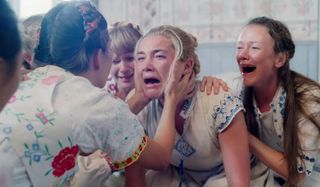 Midsommar Florence Pugh in painful anguish, among the local women