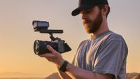 Videographer holding a Sony FX5