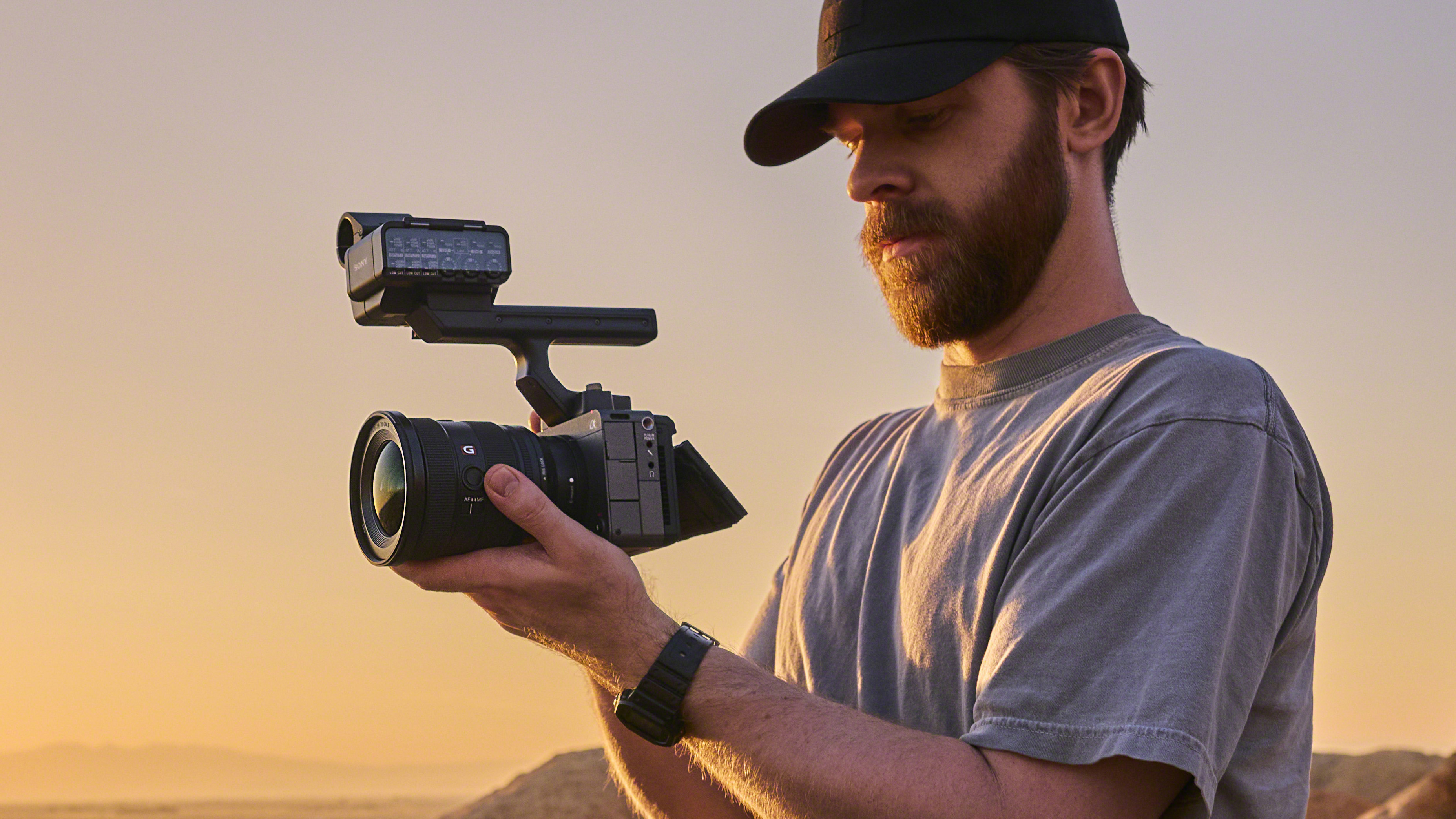 Videographer holding a Sony FX5