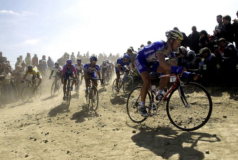 The protagonists of the 2003 Paris-Roubaix on a sector of pave