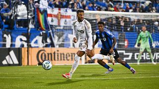 Denis Bouanga #99 of Los Angeles Football Club runs after the ball during the second half against CF Montréal at Saputo Stadium on May 24, 2025 in Montreal, Quebec, Canada. CF Montréal and Los Angeles Football Club finish in a 2-2 draw. 