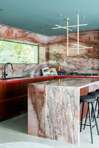 modern kitchen island with marbled surfaces