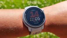 A close-up picture of our reviewer wearing the Coros Pace Pro watch