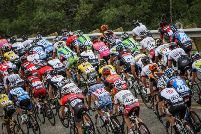 The field was packed tight as they hit the climb.
