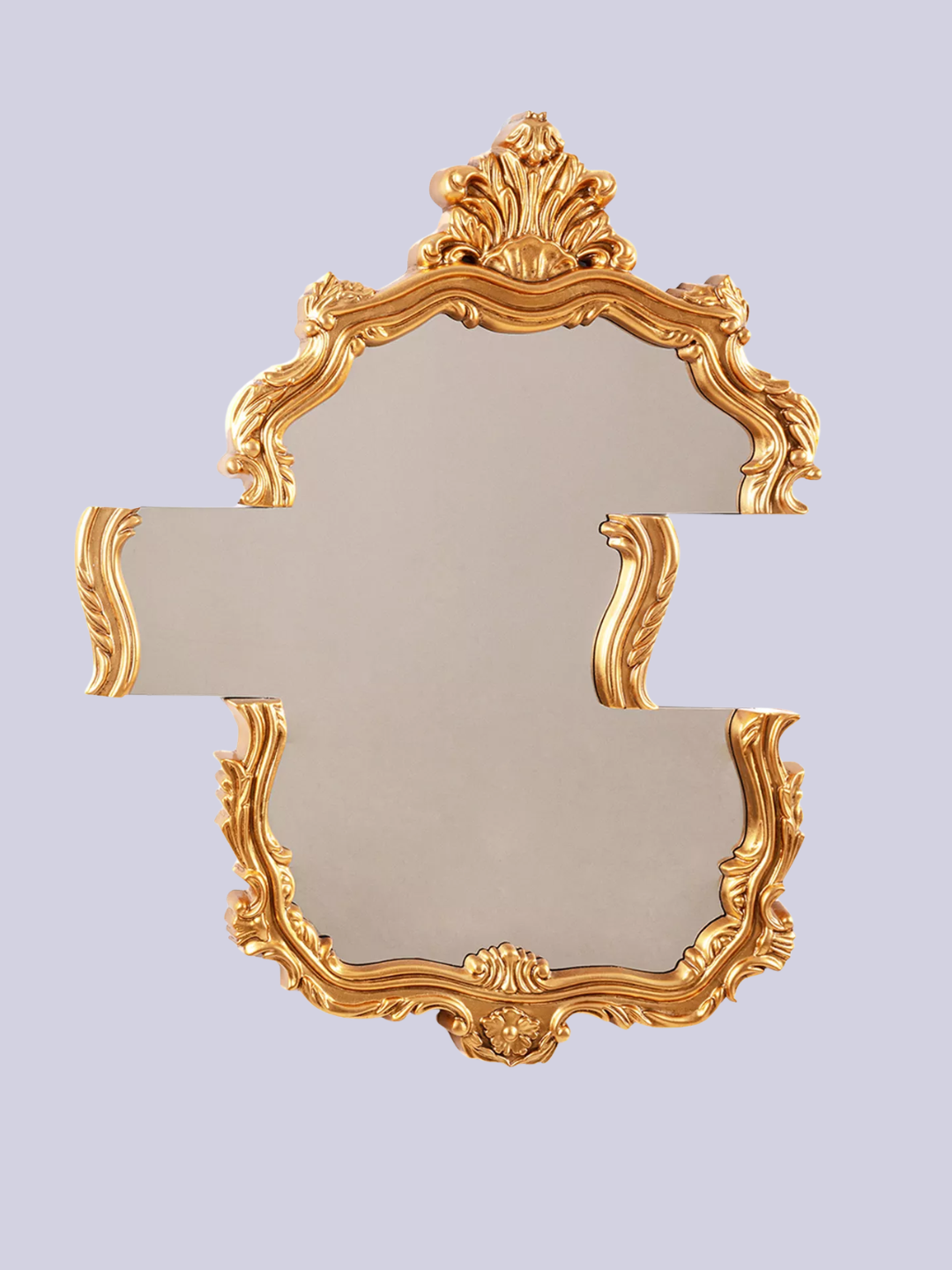 A gold framed mirror with a distorted design from Seletti