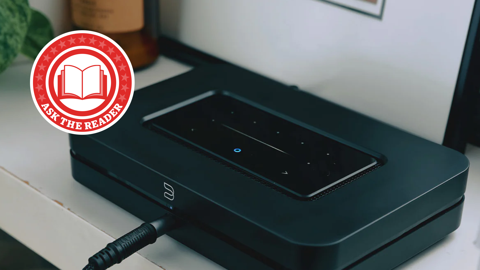 Bluesound Node streamer with Ask the Reader logo on top