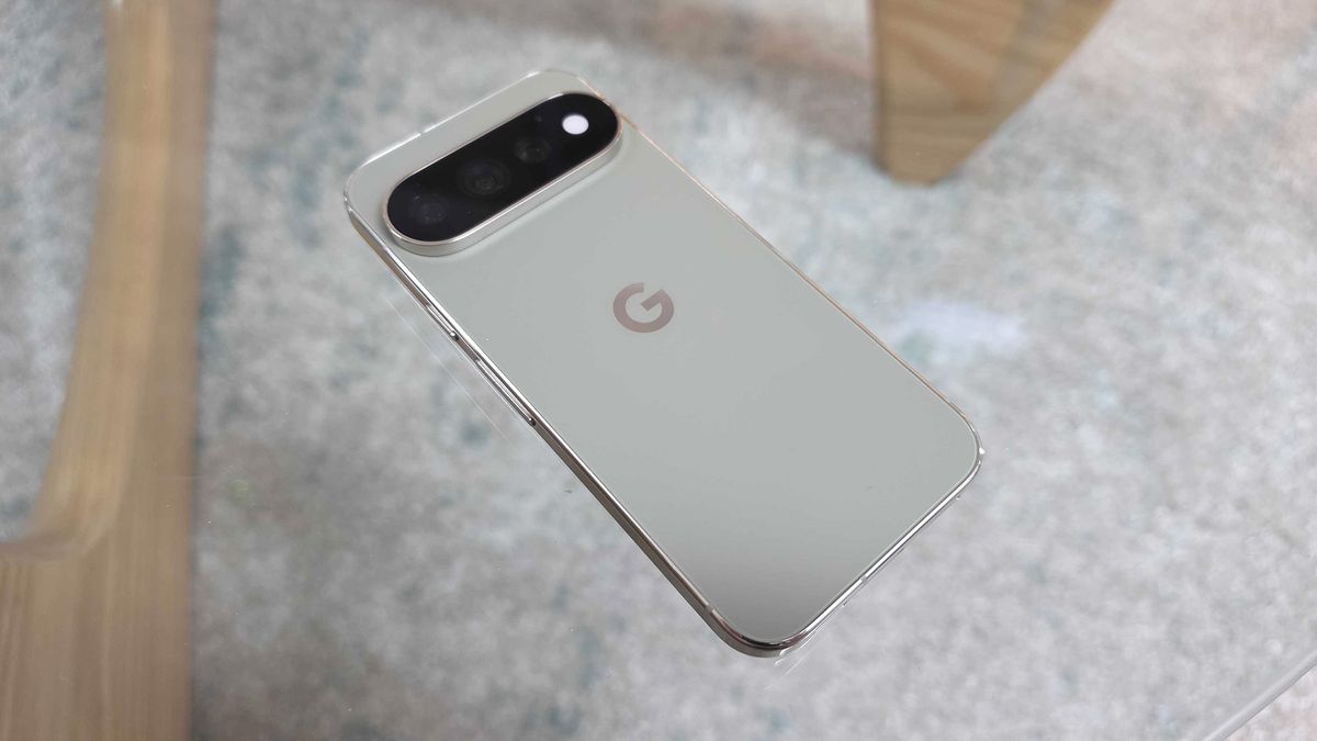 Google Pixel 11 Pro lying face down on glass table