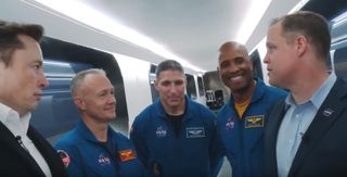A still from a video filmed in anticipation of Demo-1, the first test flight for the Crew Dragon capsule developed by SpaceX through a partnership with NASA. From left to right: Elon Musk, NASA astronaut Doug Hurley, NASA astronaut Mike Hopkins, NASA astronaut Victor Glover, NASA Administrator Jim Bridenstine and NASA astronaut Bob Behnken.