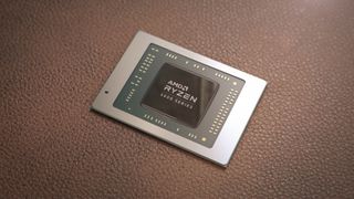 AMD Ryzen 5000 chip on leather background