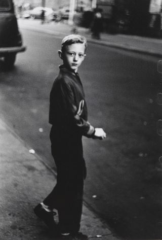 Boy stepping off the curb, N.Y.C. 1957–58, by Diane Arbus