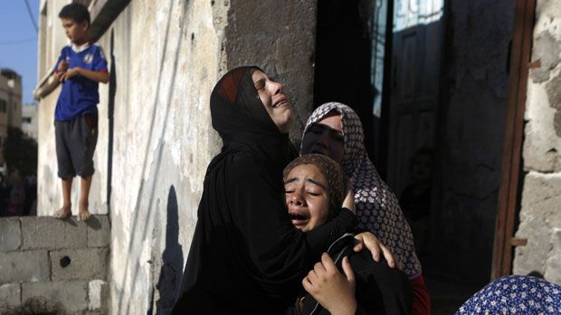 Women mourn the deaths of four Palestinian boys 