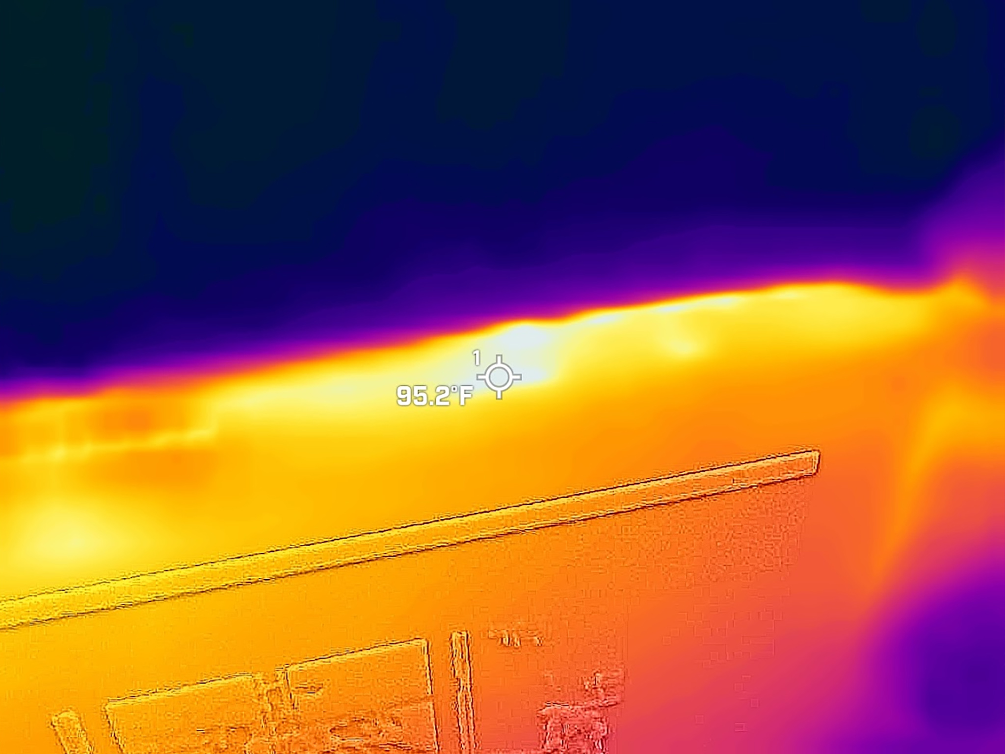 A picture taken with a thermal camera that shows that the ROG Xbox Ally X's microSD card reader at 95 degrees F.